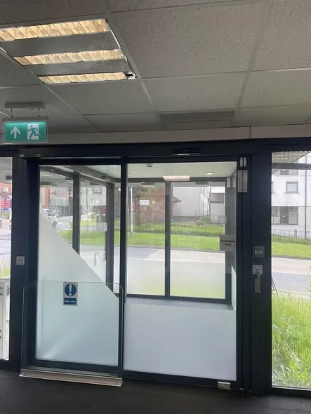 Automatic door services: a sliding door lobby with fixed glazed side screens