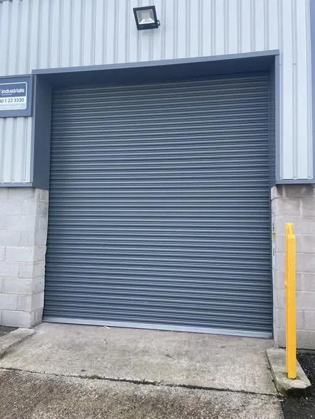Grey roller shutter on an industrial unit